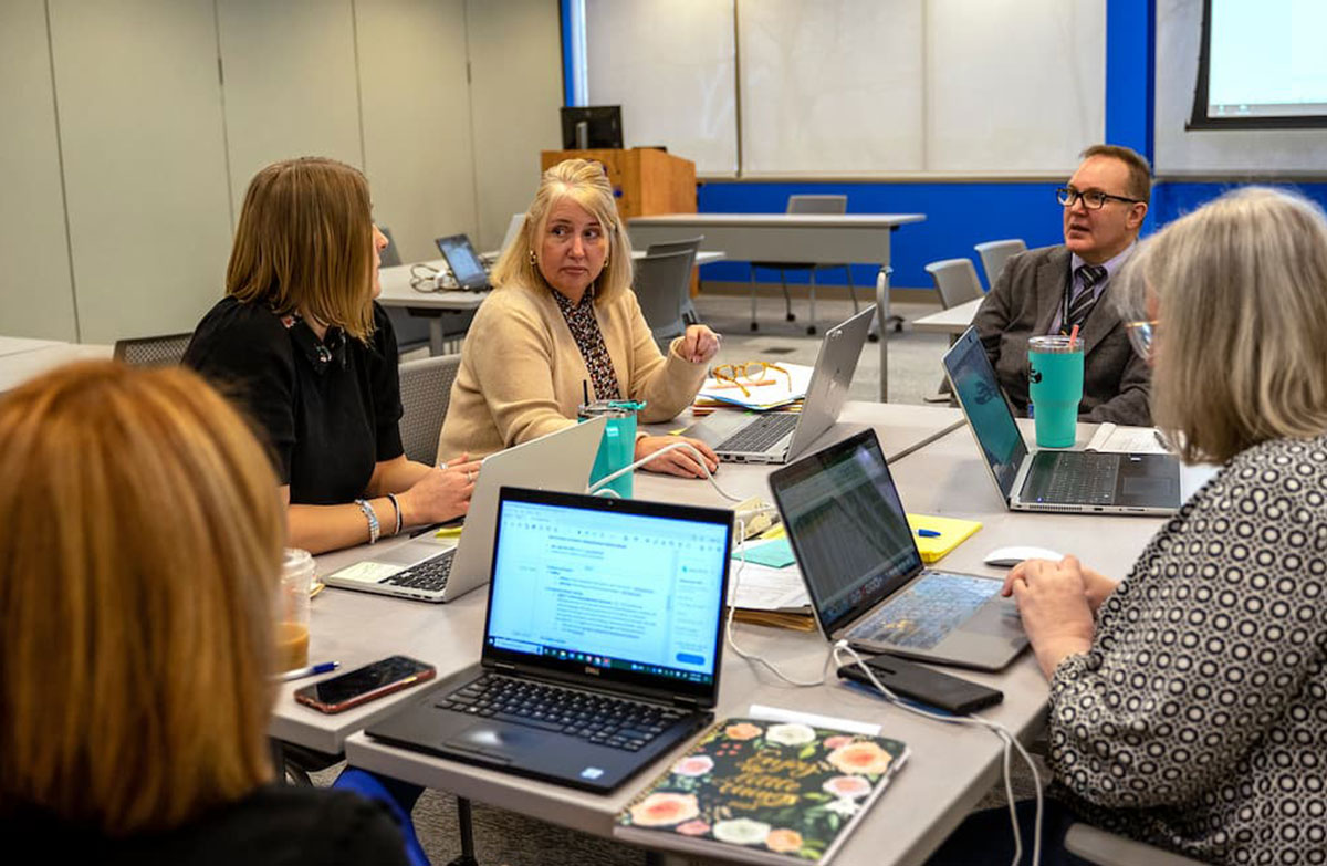 Educators in a meeting